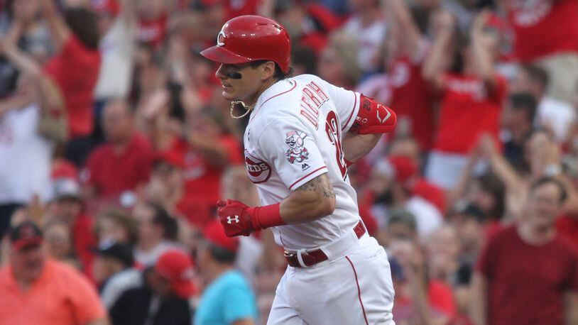 The Reds’ Derek Dietrich rounds the bases after a home run against the Astros on June 18, 2019, at Great American Ball Park in Cincinnati. David Jablonski/Staff