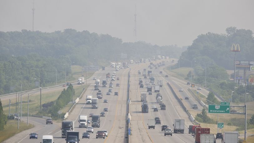A haze can be seen looking north on I-75 near Middletown Tuesday, June 6, 2023. Smoke from wildfires in Canada has prompted an air quality alert for several southwest Ohio counties. NICK GRAHAM/STAFF