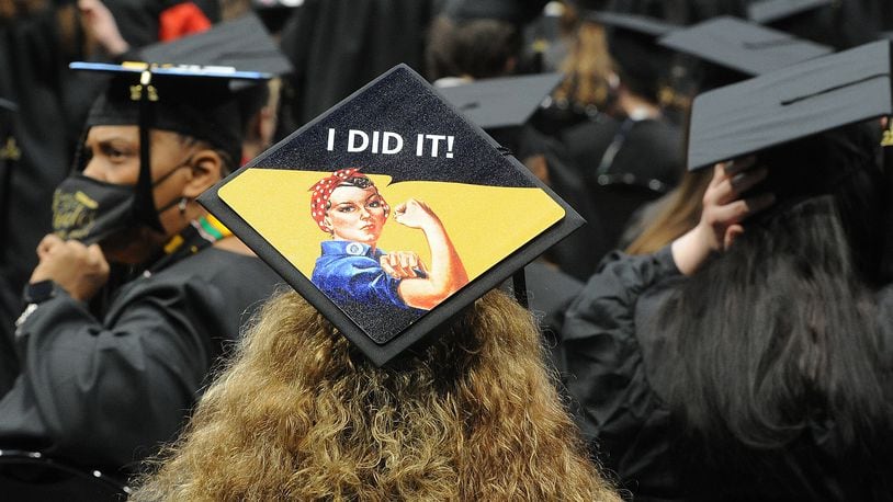 Student loan forgiveness is targeted at borrowers who have smaller loan amounts and make less than $75,000 per year, according to President Joe Biden's administration. Sinclair Community College graduation was held at the University of Dayton Arena Thursday, May 6, 2021. MARSHALL GORBY\STAFF