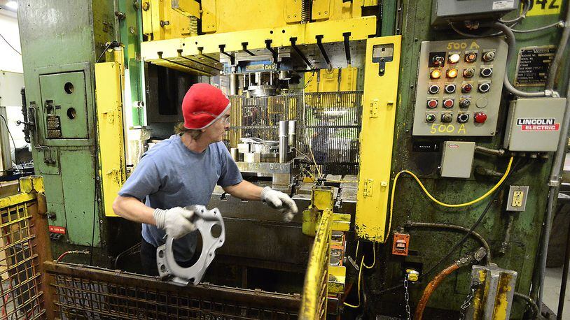 An employee works at Pentaflex, a Springfield firm that announced plans to expand its manufacturing facility in 2015. The company’s expansion was one of the largest commercial projects listed among commercial building permits in 2015 in Springfield. Staff file photo