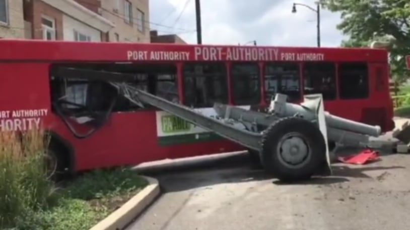 A bus crashed into multiple vehicles and then a cannon at a veterans memorial before coming to a stop. (Photo: Screengrab via WPXI/YouTube)