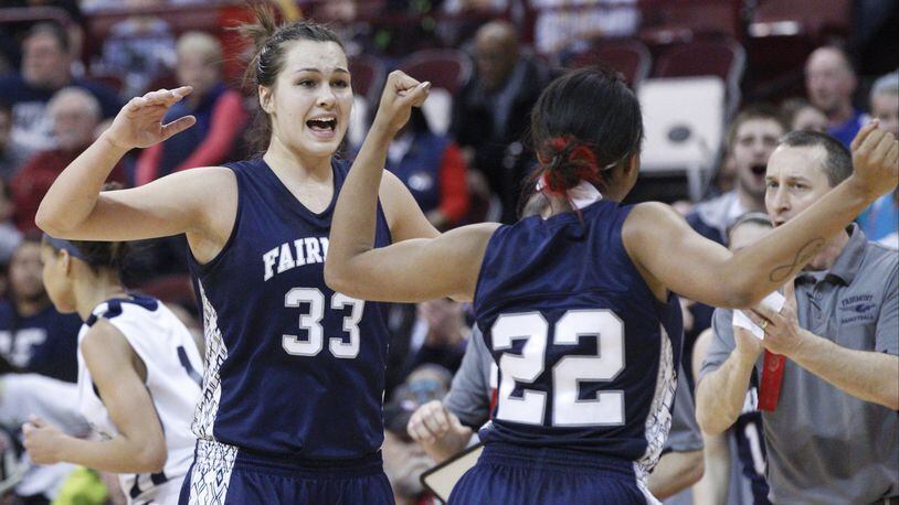 Kathryn Westbeld (33) and Chelsea Welch (22) of Fairmont react to a foul during Saturday’s Division I state championship basketball game against Twinsburg at the Jerome Schottenstein Center in Columbus on March 16, 2013. Fairmont won the game 52-48 to claim the state title. Barbara J. Perenic/Staff