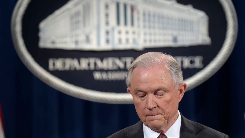 Attorney General Jeff Sessions pauses during a news conference at the Justice Department in Washington, Thursday, March 2, 2017. Sessions said he will recuse himself from a federal investigation into Russian interference in the 2016 White House election. (AP Photo/Susan Walsh)