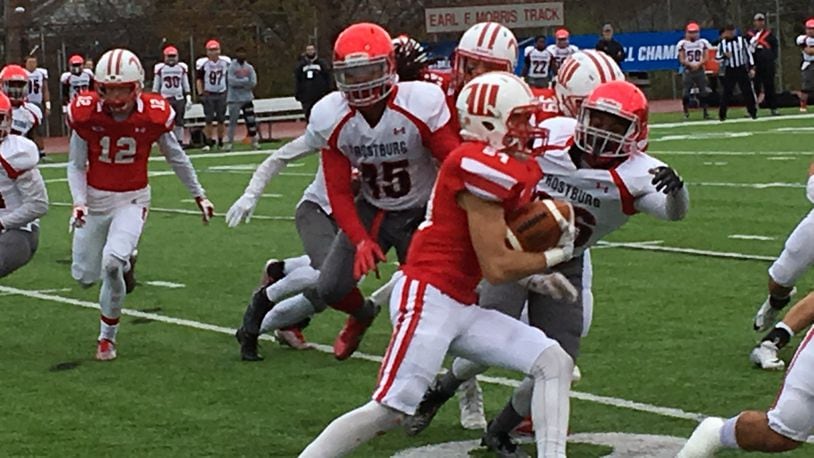 Wittenberg’s Sam Kayser returns a kickoff Saturday in the Tigers’ first round NCAA Dividion III playoff game against Frostburg State. BRETT TURNER / CONTRIBUTED