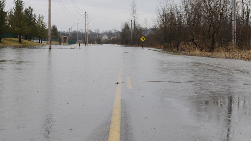 Factory Road in Beavercreek Twp. is closed today due to high water. NICK GRAHAM/STAFF