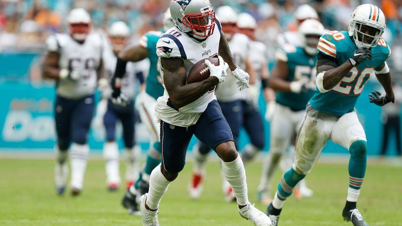 MIAMI, FL - DECEMBER 09: Josh Gordon #10 of the New England Patriots carries the ball durig the second half against the Miami Dolphins at Hard Rock Stadium on December 9, 2018 in Miami, Florida. (Photo by Michael Reaves/Getty Images)