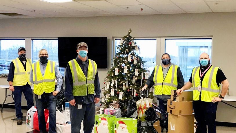 Silfex employees in Springfield collected toys, clothes and other gifts for local kids as part of the Salvation Army’s Angel Tree program in December. From L to R: Mark Nagel, Steve Estep, Tyler Weiss, Colleen Friedsberg and Kyle Lacey