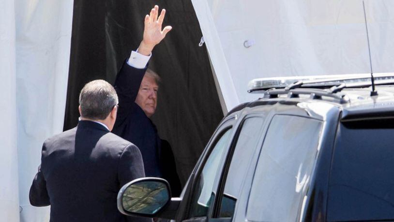 President Donald J. Trump’s waves to crowd as he exits Bethesda-by-the-Sea Episcopal Church in Palm Beach, Florida on Easter Sunday, April 16, 2017. (Photo: Allen Eyestone / Palm Beach Post)