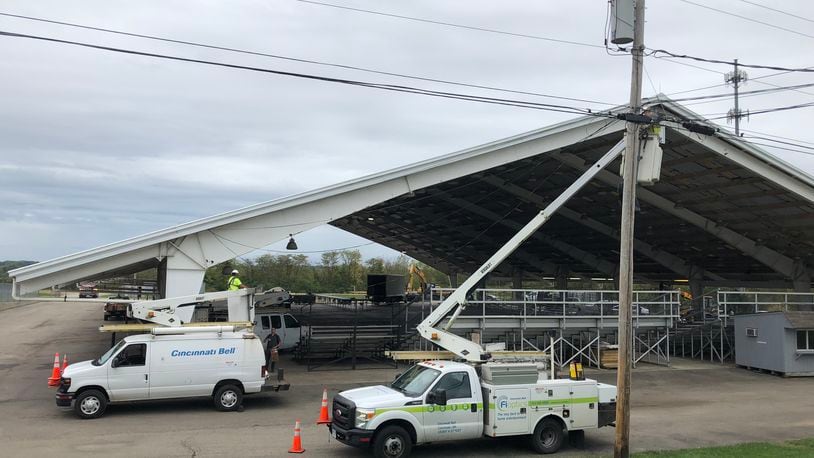 Cincinnati Bell crews were working on Wednesday in anticipation of President Donald Trump’s rally Friday night at the Warren County Fairgrounds in Lebanon. STAFF/LAWRENCE BUDD