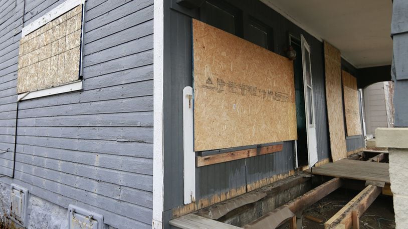 Ohio enacted the nation’s first statewide ban on mortgage lenders using plywood to board up vacant structures, which some officials hope will help disguise and stop the spread of housing abandonment and blight. Bill Lackey/Staff