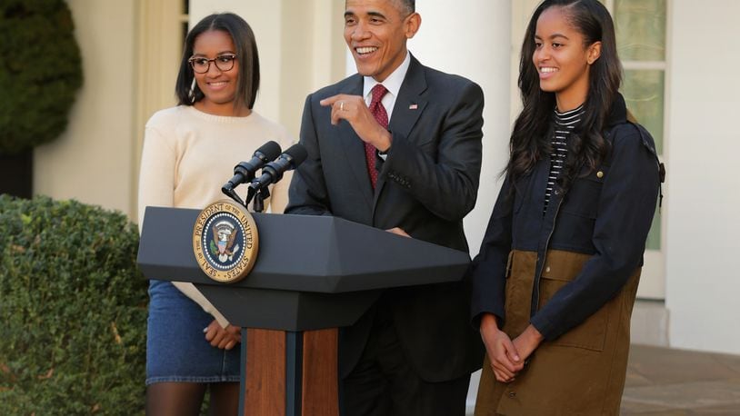 WASHINGTON, DC - NOVEMBER 25: U.S. President Barack Obama delivers remarks with his daughters Sasha (L) and Malia during the annual turkey pardoning ceremony in the Rose Garden at the White House November 25, 2015 in Washington, DC.  (Photo by Chip Somodevilla/Getty Images)