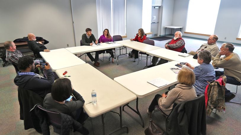 Staff from U.S. Sen. Sherrod Brown’s office met with Champaign County farmers Thursday afternoon to discuss the latest version of the farm bill and what should be included. Bill Lackey/Staff