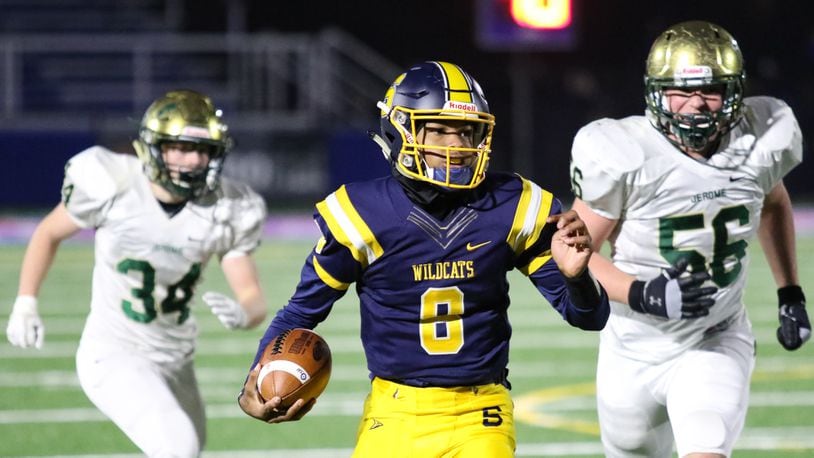 Springfield High School sophomore quarterback Te’Sean Smoot runs the ball during the Wildcats’ 37-14 victory over Dublin Jerome in a D-I, Region 2 semifinal game at Marysville High School on Friday, Nov. 15, 2019. CONTRIBUTED PHOTO BY MICHAEL COOPER