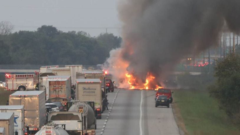 Pictured is a crash on Interstate 70 that killed a driver Thursday morning. Three separate crashes, all involving vehicles that caught fire, resulted in two deaths. STAFF/BILL LACKEY