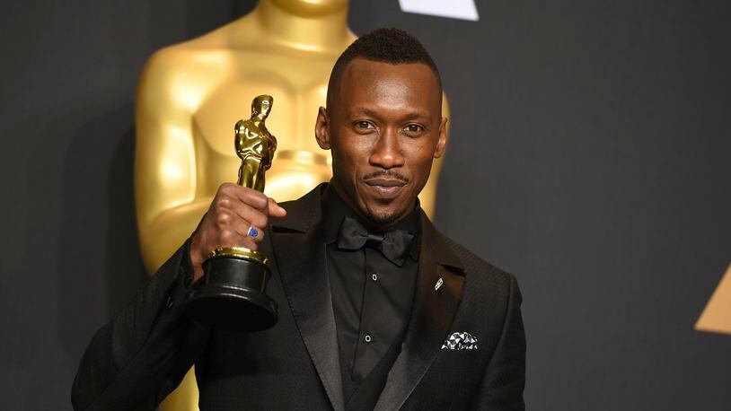 Mahershala Ali poses in the press room with the award for best actor in a supporting role for "Moonlight" at the Oscars on Sunday, Feb. 26, 2017, at the Dolby Theatre in Los Angeles. (Photo by Jordan Strauss/Invision/AP)