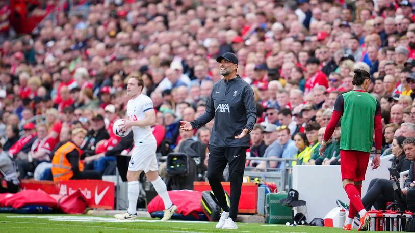 Liverpool's manager Jurgen Klopp, center, gestures during the English Premier League soccer match between Liverpool and Tottenham Hotspur at Anfield Stadium in Liverpool, England, Sunday, May 5, 2024. (AP Photo/Jon Super)