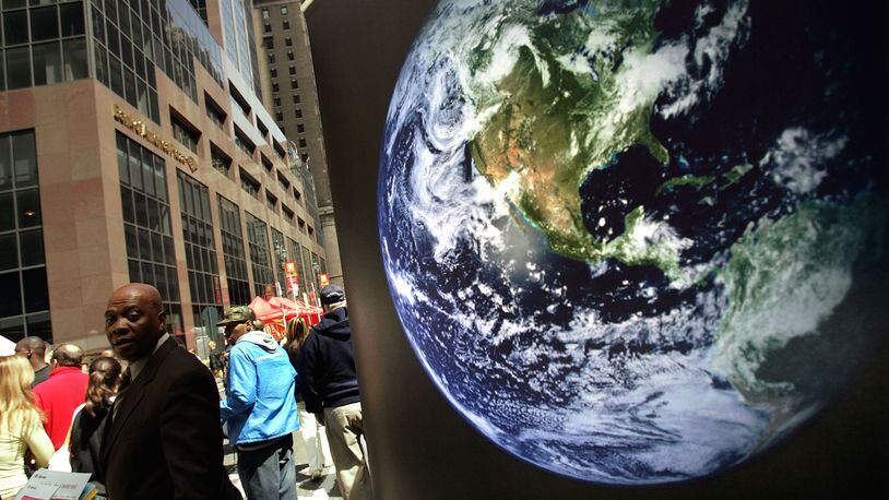 NEW YORK - APRIL 22: An image of the earth is displayed outside of a booth celebrating the 35th anniversary of Earth Day April 22, 2005 in New York City. While environmental degradation is still an urgent global problem, much has been achieved since the first Earth Day in 1970, including passage of the Clean Air Act, Clean Water Act, Endangered Species Act and Environmental Policy Act. (Photo by Spencer Platt/Getty Images)
