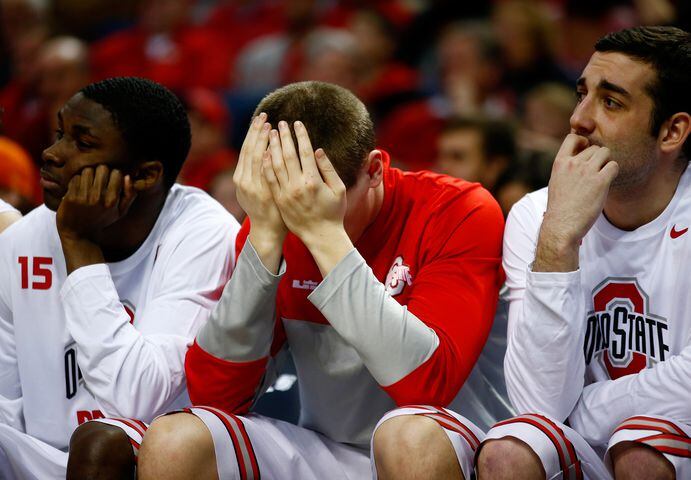 Dayton Flyers defeat the Ohio State Buckeyes in the second round of the 2014 NCAA Men's Basketball Tournament