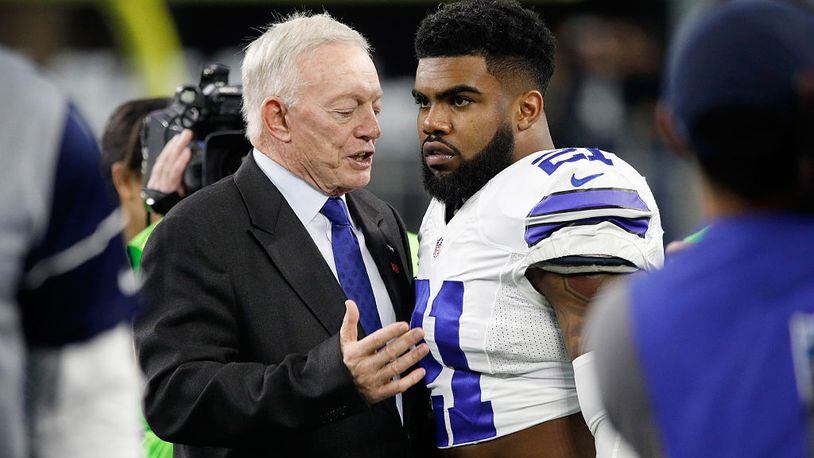 ARLINGTON, TX - JANUARY 15: Dallas Cowboys owner Jerry Jones talks with Ezekiel Elliott #21 of the Dallas Cowboys before the NFC Divisional Playoff Game against the Green Bay Packers at AT&T Stadium on January 15, 2017 in Arlington, Texas. (Photo by Joe Robbins/Getty Images)