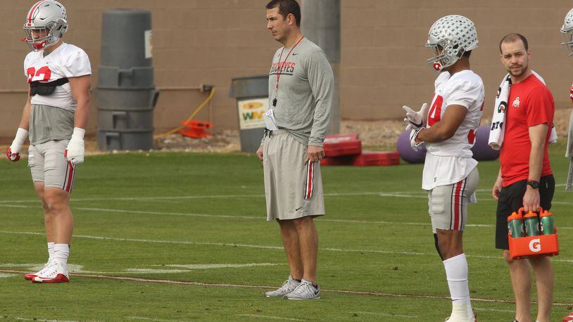 Ohio State’s Luke Fickell watches a drill during a Fiesta Bowl practice at Notre Dame Prep Academy on Wednesday, Dec. 28, 2016, in Scottsdale, Ariz. David Jablonski/Staff