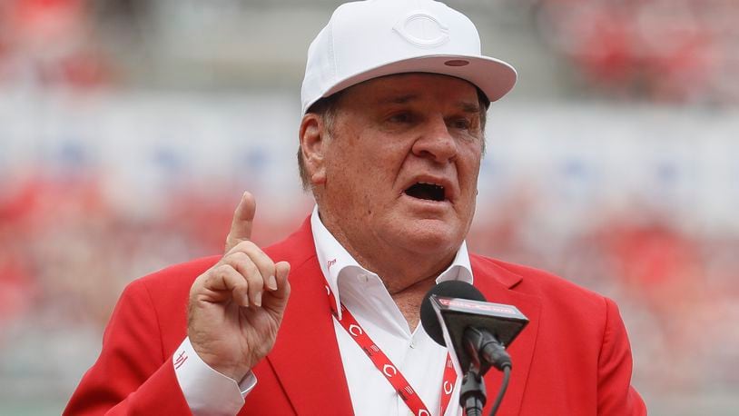 FILE -  Pete Rose speaks during a statue-dedication ceremony before a baseball game between the Cincinnati Reds and the Los Angeles Dodgers, June 17, 2017, in Cincinnati.   (AP Photo/John Minchillo, File)