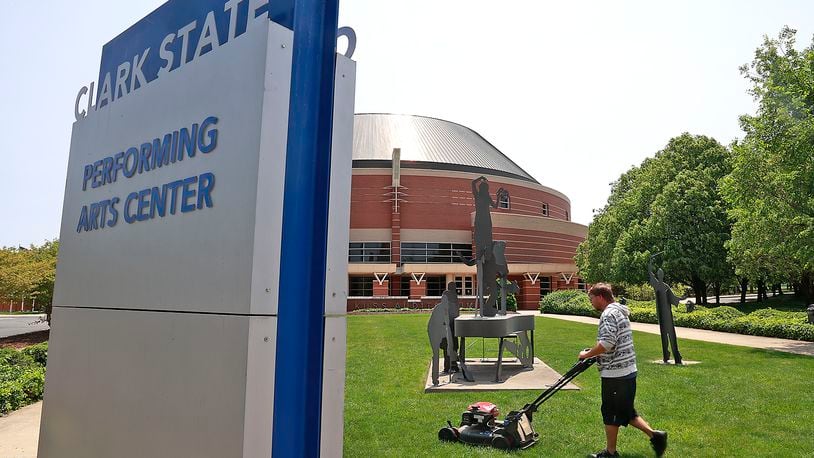 Anthony Oty, a maintenance worker at Clark State College, cuts the grass in front of the Clark State Performing Arts Center Wednesday, May 17, 2023. Oty said the Performing Arts Center was opened the same year he was born, 30 years ago. BILL LACKEY/STAFF
