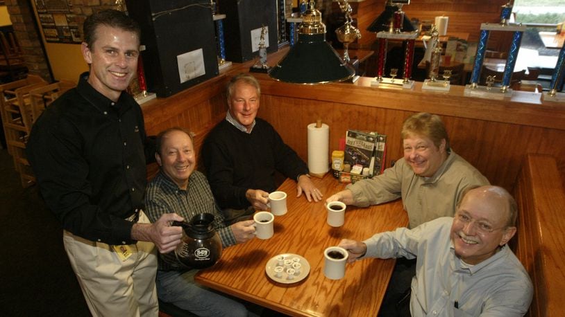 Beef O’Brady’s owner Bill DeFries, left, with some friends in a 2009 photo. CHRIS STEWART/STAFF