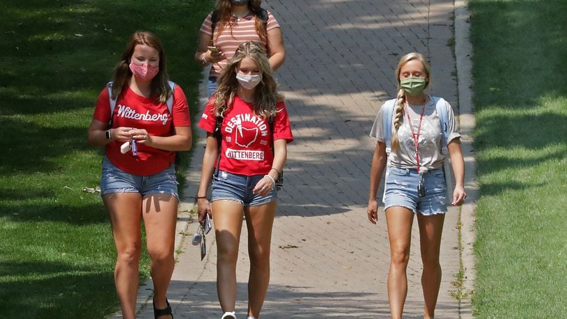 Wittenberg University students walk across campus on Aug. 26, 2020. The university will run an on-campus COVID-19 vaccination clinic for students from 9:30 a.m. until 3 p.m. on Thursday in the University’s Health, Wellness and Athletics Complex. BILL LACKEY/STAFF