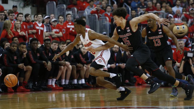 Ohio State’s C.J. Jackson, left, and Nebraska’s Isaiah Roby chase the ball during the first half of an NCAA college basketball game Monday, Jan. 22, 2018, in Columbus, Ohio. (AP Photo/Jay LaPrete)