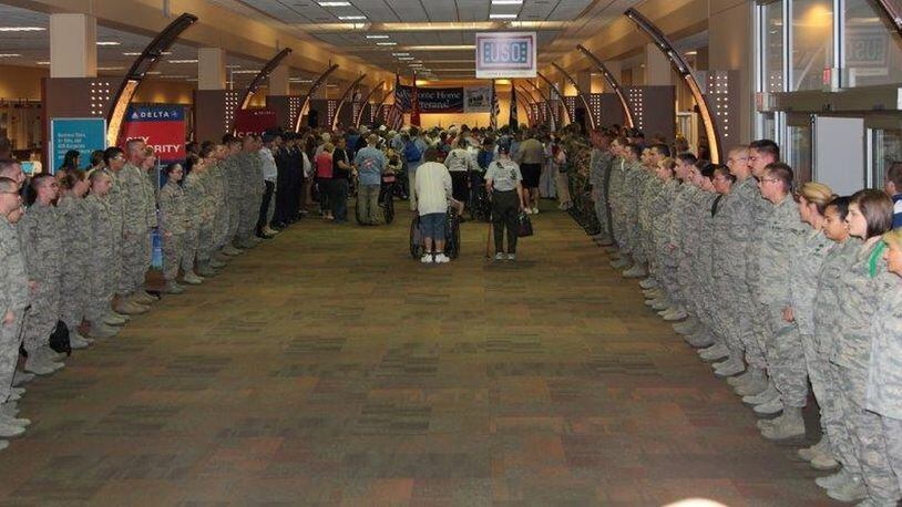 Airmen greet Honor Flight Dayton veterans returning from their final 2017 trip last November. CONTRIBUTED