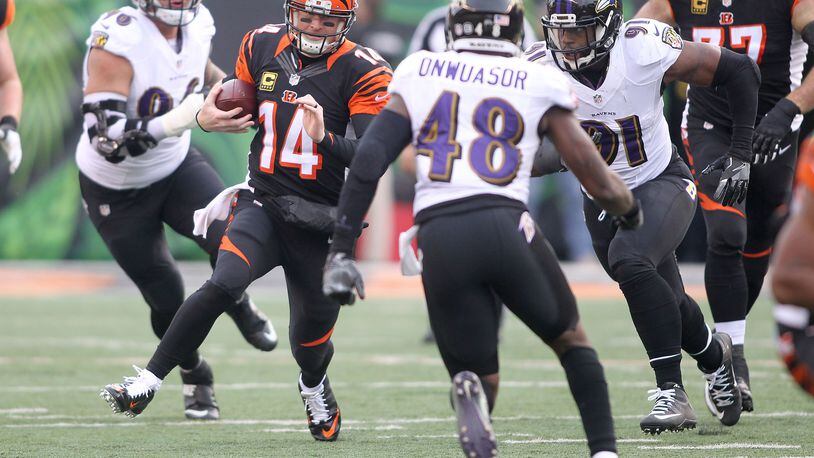 In mere hours, Bengals quarterback Andy Dalton and his teammates will officially resume the business of football as training camp opens Friday at 3 p.m. The first regular season game, on Sept. 10 at Paul Brown Stadium, will be against the Ravens. Cincinnati beat Baltimore 27-10 to close the 2016 season, as Dalton tried here  to avoid Ravens defenders in Paul Brown Stadium.