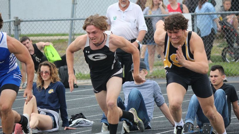 Greenon’s Derek Brown (left) and Shawnee’s Jack McCrory break out of the blocks during the 100 dash at the Division II district meet Saturday at Graham High School. Brown wilal be a starting running back/defensive back this fall for the football team. GREG BILLING / CONTRIBUTED