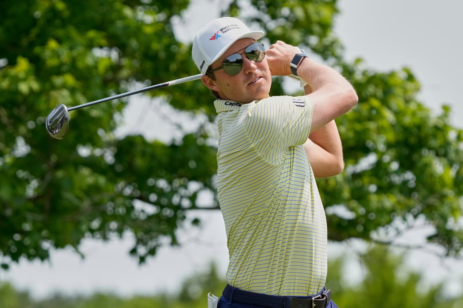 Ben Griffin hits from the fifth tee during the final round of the Memorial golf tournament Sunday, June 1, 2025, in Dublin, Ohio. (AP Photo/Sue Ogrocki)