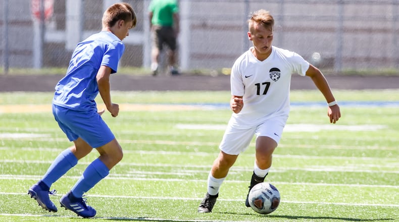 Greenon High School junior Trent Green (right) dribbles the ball during a scrimmage against Northwestern at Springfield High School on on Aug. 13, 2019. CONTRIBUTED PHOTO BY MICHAEL COOPER