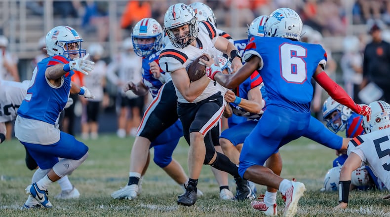 Waynesville High School senior Alex Amburgy runs the ball during their game against Greeneview this season. Michael Cooper/CONTRIBUTED