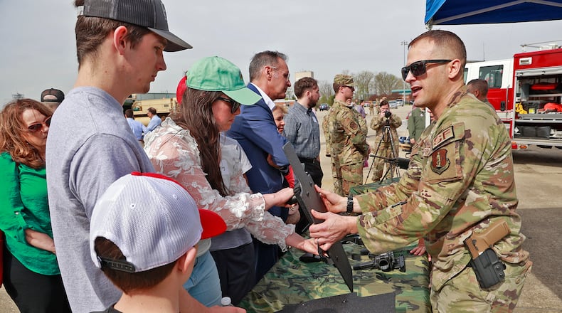 The Springfield Air National Guard Base held the annual Community Day event Thursday, April 20, 2023. Colonel Kent Kazmaier, Commander of the 178th Wing, talked about their mission before community members got the chance to see some of the equipment the different departments on base use. Bus tours were also given of the base. BILL LACKEY/STAFF