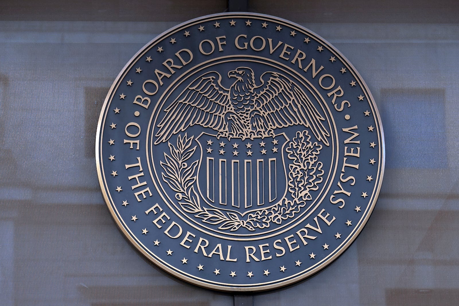 FILE - The seal of the Federal Reserve Board is seen at the Building in Washington, Saturday, Dec. 8, 2024. (AP Photo/Jose Luis Magana)