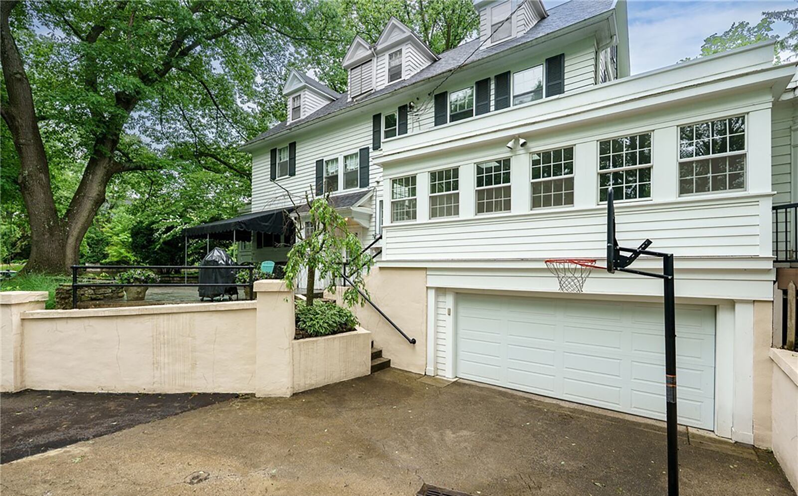 The home has a two car garage at the basement level.
