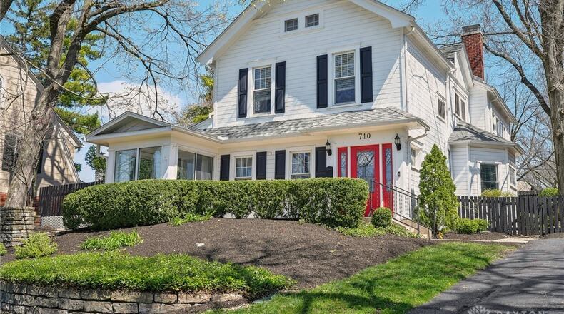 The four bedroom home has four levels, including a partially finished basement and attic with the fourth bedroom.