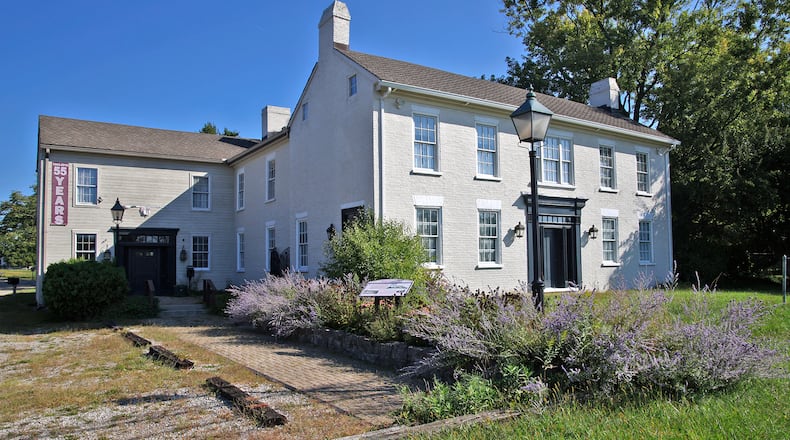 The Buena Vista Tavern at 8518 East National Road in Clark County has been a tavern, camp ground, private residence and a lamp shop since it was built 1836. BILL LACKEY/STAFF