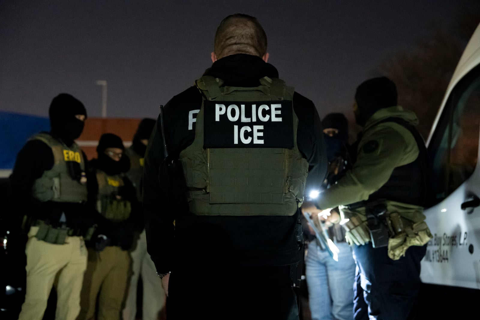 FILE - U.S. Immigration and Customs Enforcement officers gather for a briefing before an enforcement operation, Jan. 27, 2025, in Silver Spring, Md. (AP Photo/Alex Brandon, File)