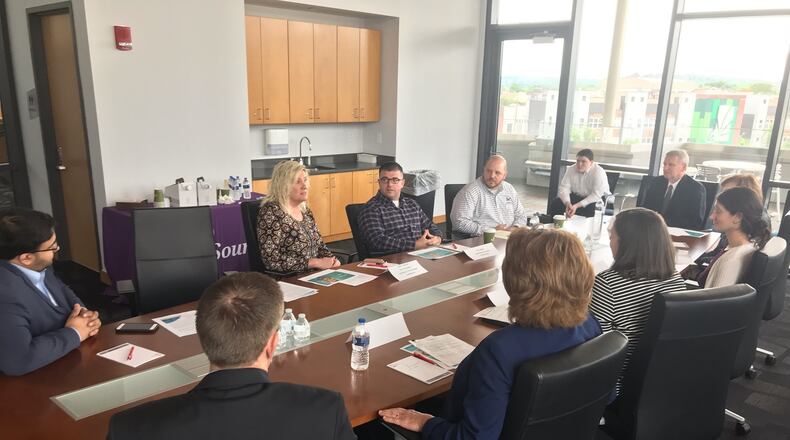 CareSource officials, state representatives, and local nonprofit leaders met with Ohio Medicaid Director Maureen Corcoran to talk about the insurer’s Life Services program. KAITLIN SCHROEDER
