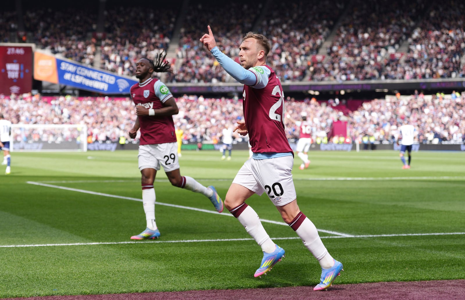West Ham United's Jarrod Bowen celebrates scoring his side's first goal of the game, during the English Premier League soccer match between West Ham United and Tottenham Hotspur, at the London Stadium, in London, Sunday May 4, 2025. (Bradley Collyer/PA via AP)