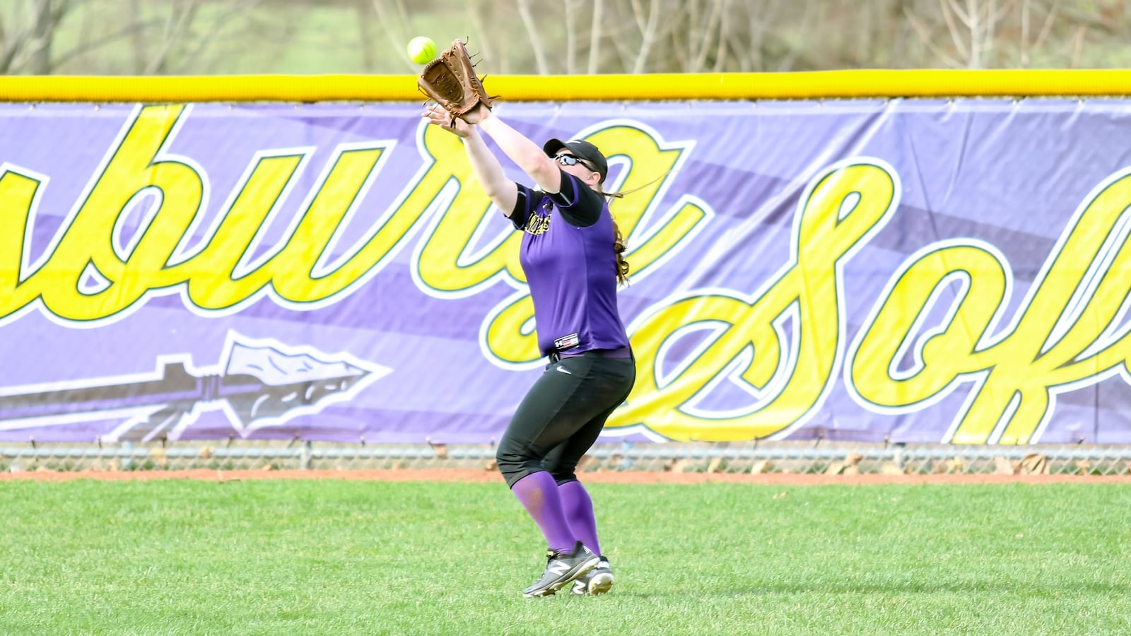 Mechanicsburg sophomore center fielder Megan Alspaugh catches a fly ball during their game against Madison Plains on Friday, April 12. MICHAEL COOPER / CONTRIBUTED