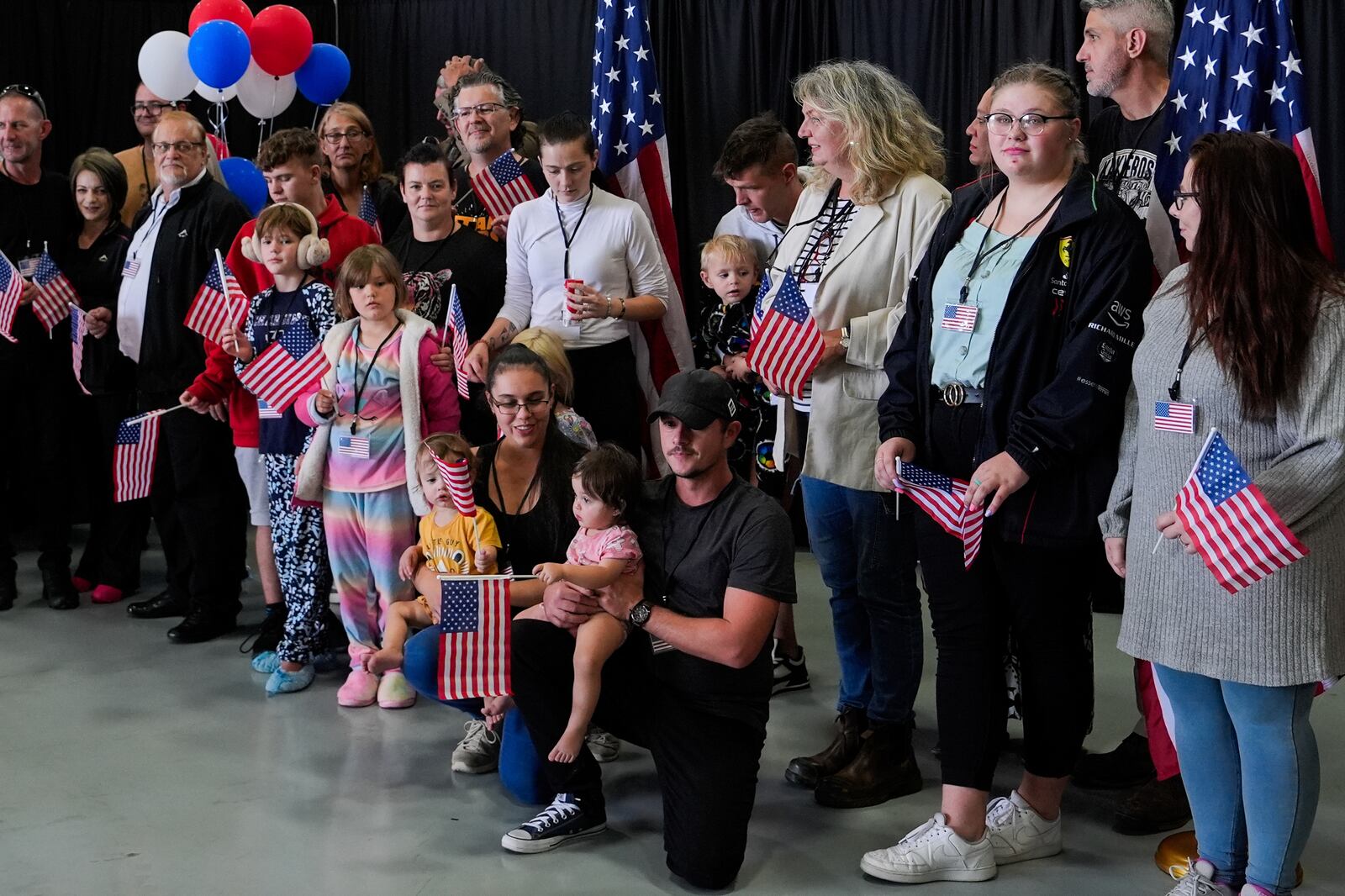Afrikaner refugees from South Africa arrive, Monday, May 12, 2025, at Dulles International Airport in Dulles, Va. (AP Photo/Julia Demaree Nikhinson)