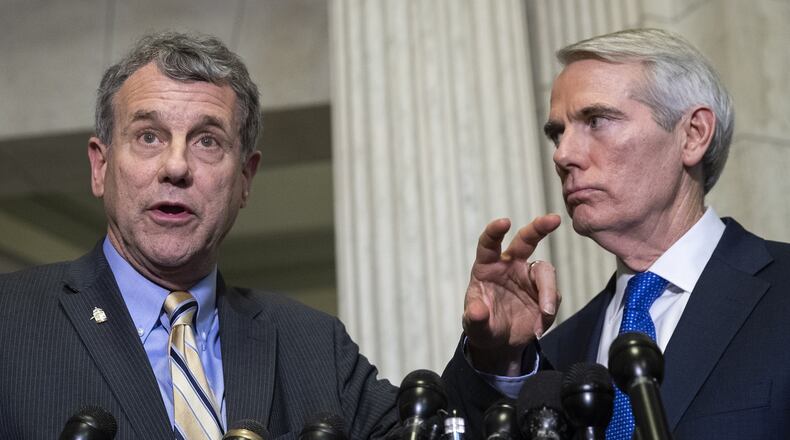 Sen. Sherrod Brown (D-OH) and Sen. Rob Portman (R-OH) (Photo by Drew Angerer/Getty Images)