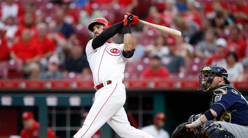 CINCINNATI, OH - SEPTEMBER 25: Eugenio Suarez #7 of the Cincinnati Reds hits a solo home run in the first inning against the Milwaukee Brewers at Great American Ball Park on September 25, 2019 in Cincinnati, Ohio. (Photo by Joe Robbins/Getty Images)