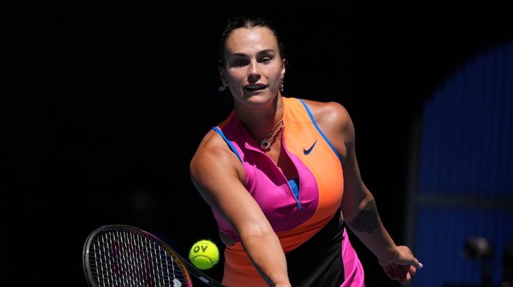Aryna Sabalenka of Belarus plays a forehand return to Iva Jovic of the U.S. during their quarterfinal match at the Australian Open tennis championship in Melbourne, Australia, Tuesday, Jan. 27, 2026. (AP Photo/Dar Yasin)