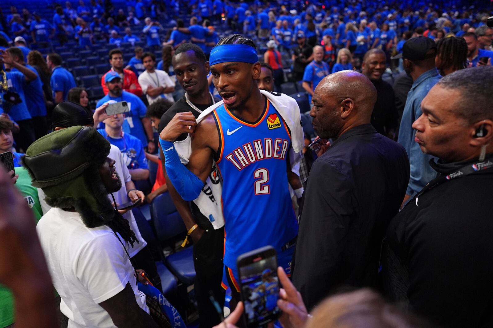 Oklahoma City Thunder guard Shai Gilgeous-Alexander (2) reacts after winning Game 2 of the NBA Finals basketball series against the Indiana Pacers Sunday, June 8, 2025, in Oklahoma City. (AP Photo/Julio Cortez)