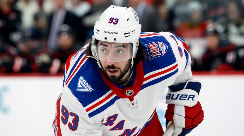 New York Rangers' Mika Zibanejad watches the puck against the Carolina Hurricanes during the first period of an NHL hockey game in Raleigh, N.C., Wednesday, Nov. 26, 2025. (AP Photo/Karl DeBlaker)